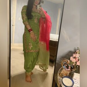 Green salwar suit heavy work with multi color chunni